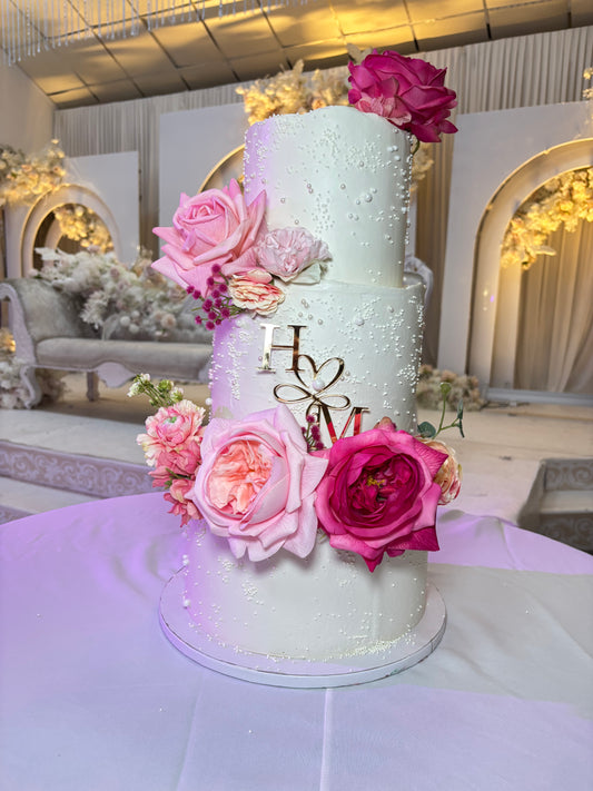 (1) 3 tier wedding cake in white with large roses